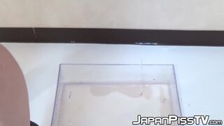 Naughty Japanese sweetie peeing through red panties